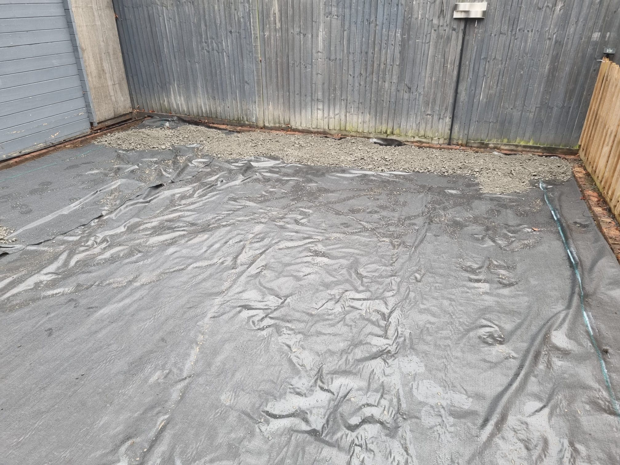 Weed membrane installation in Dartford