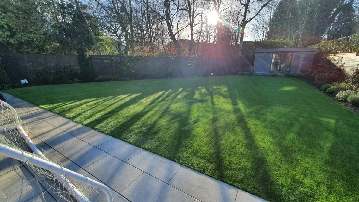 Finished artificial grass lawn on a residential garden installation